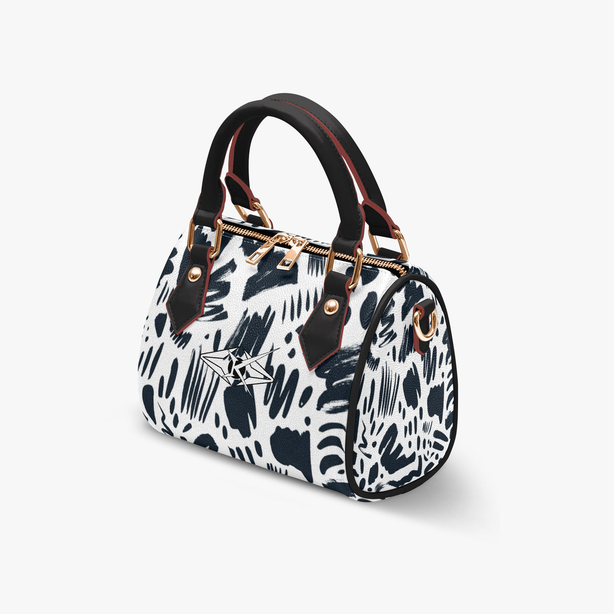 Kreator Luxe Chic Eterna handbag by Vybrational Kreators featuring a structured barrel shape black and white abstract pattern black top handle and gold hardware.