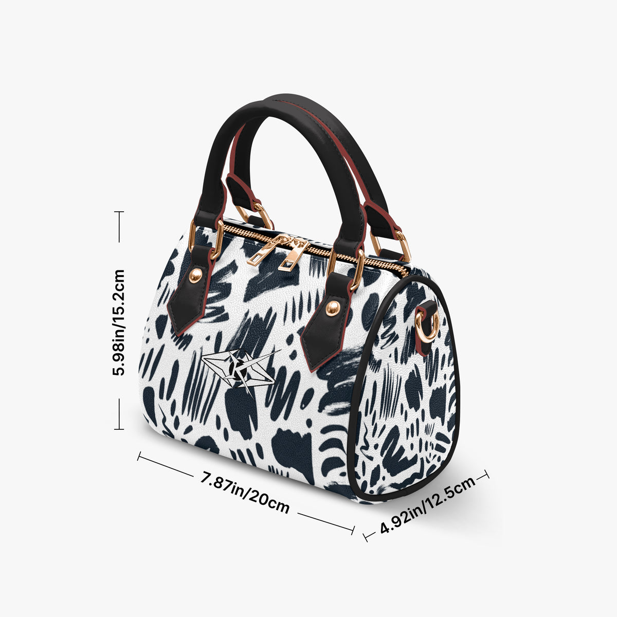Kreator Luxe Chic Eterna handbag by Vybrational Kreators featuring a structured barrel shape black and white abstract pattern black top handle and gold hardware.